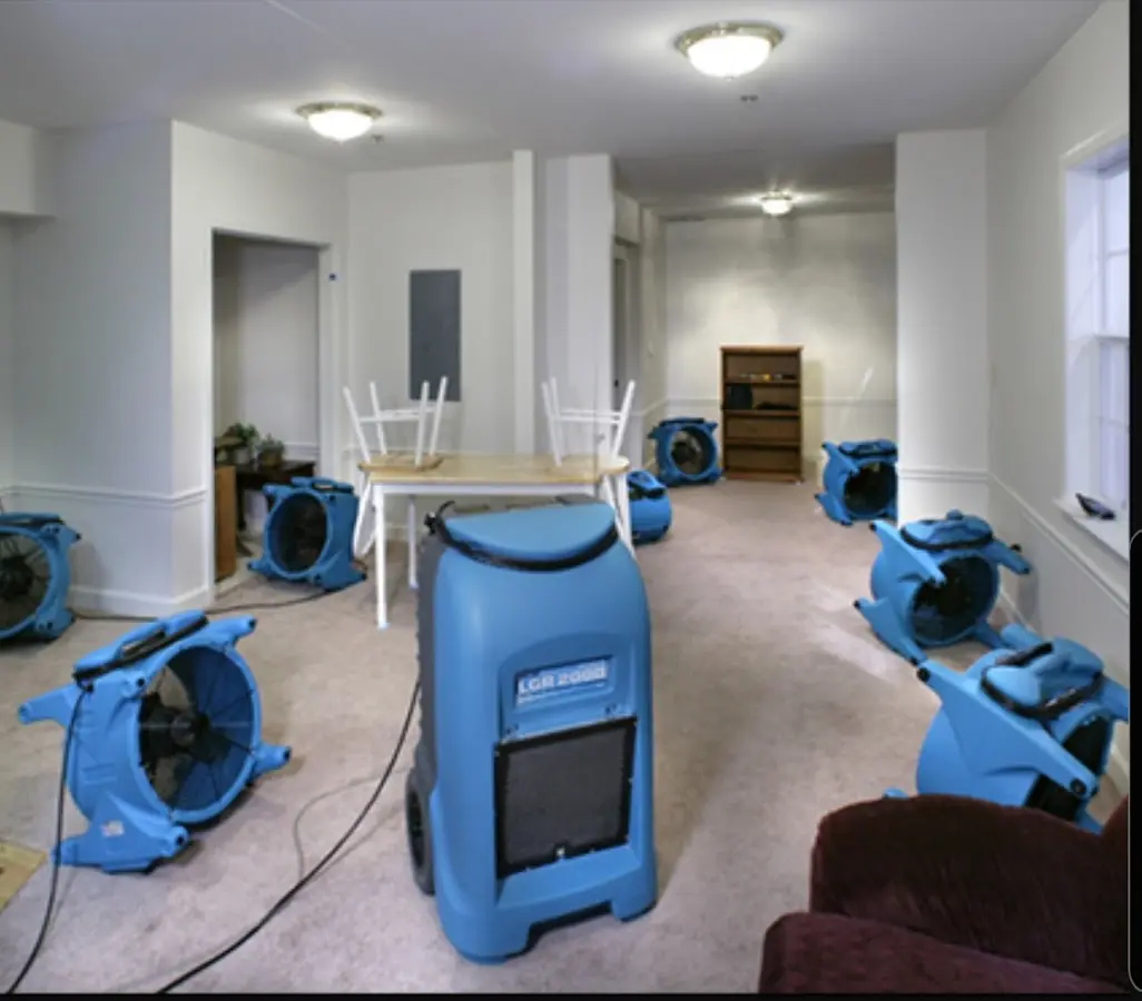 Air movers and dehumidifier setup for Water Damage Restoration in Atoka