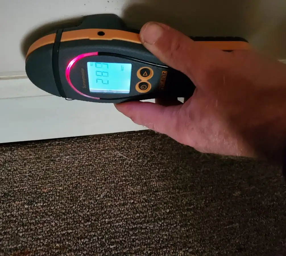 Moisture detection at baseboard during Mold Inspection & Testing in Atoka